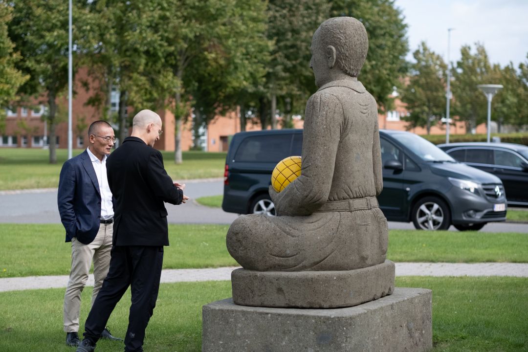 Bhutan’s Prime Minister and THORNICO Group CEO Christian Stadil outside SANOVO TECHNOLOGY GROUP headquarters.