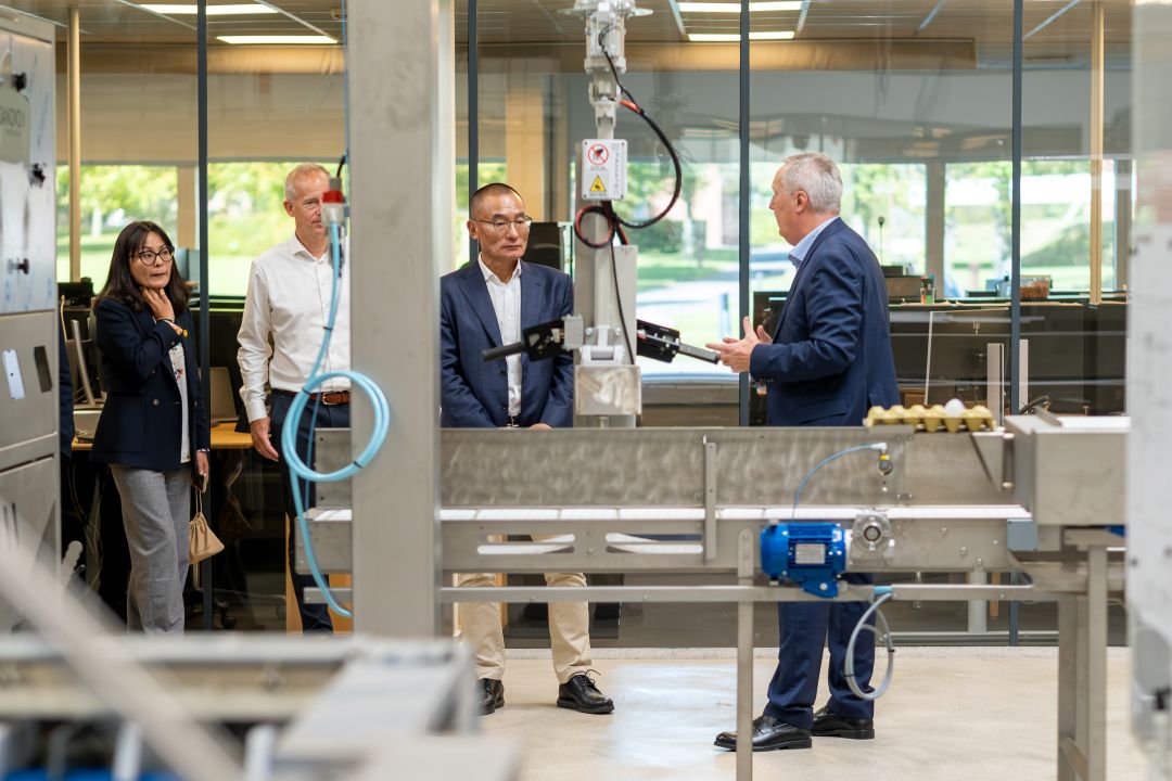 Bhutan’s Prime Minister touring SANOVO TECHNOLOGY GROUP’s factory with company leadership.