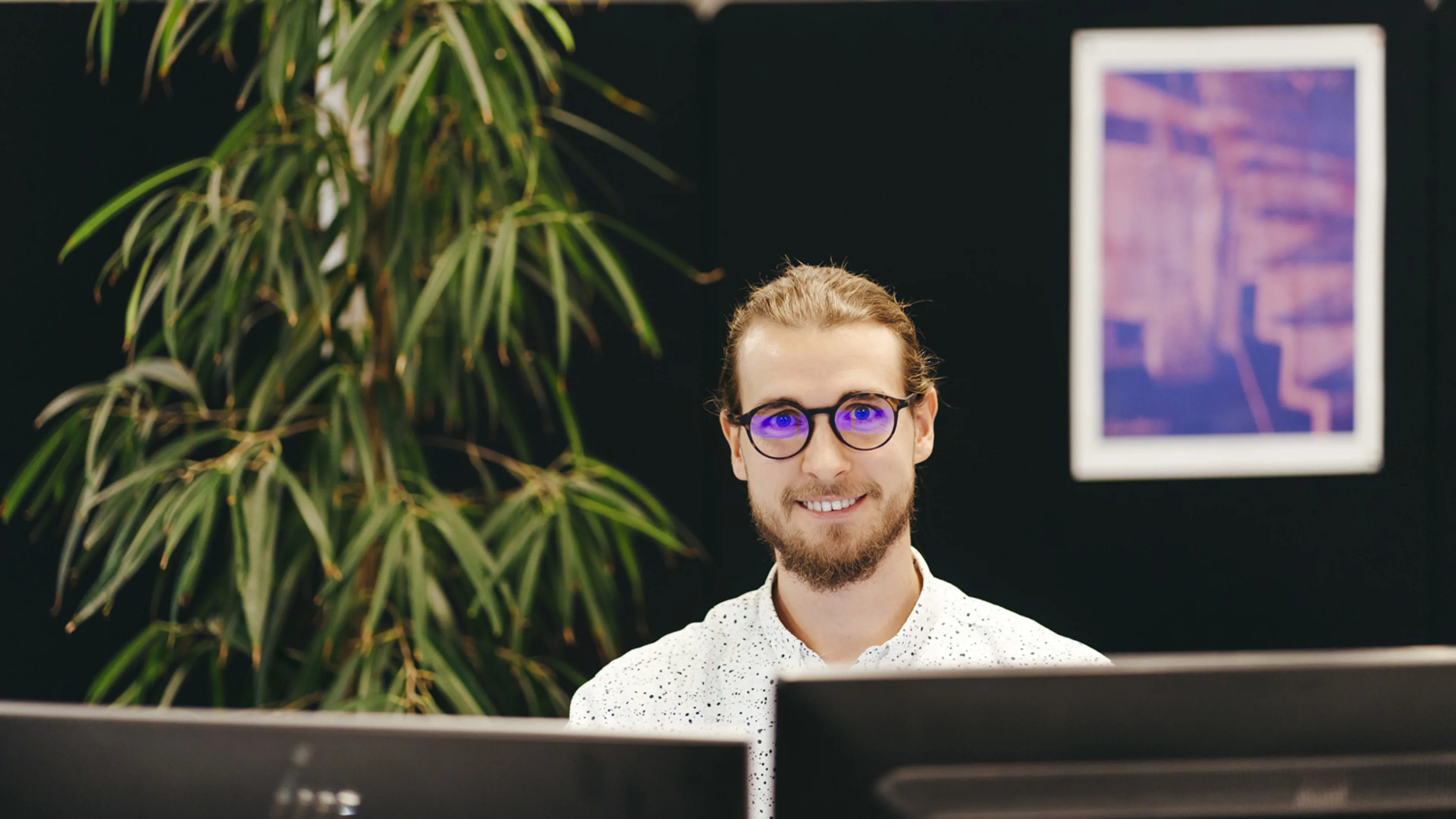 SANOVO employee working in an office environment