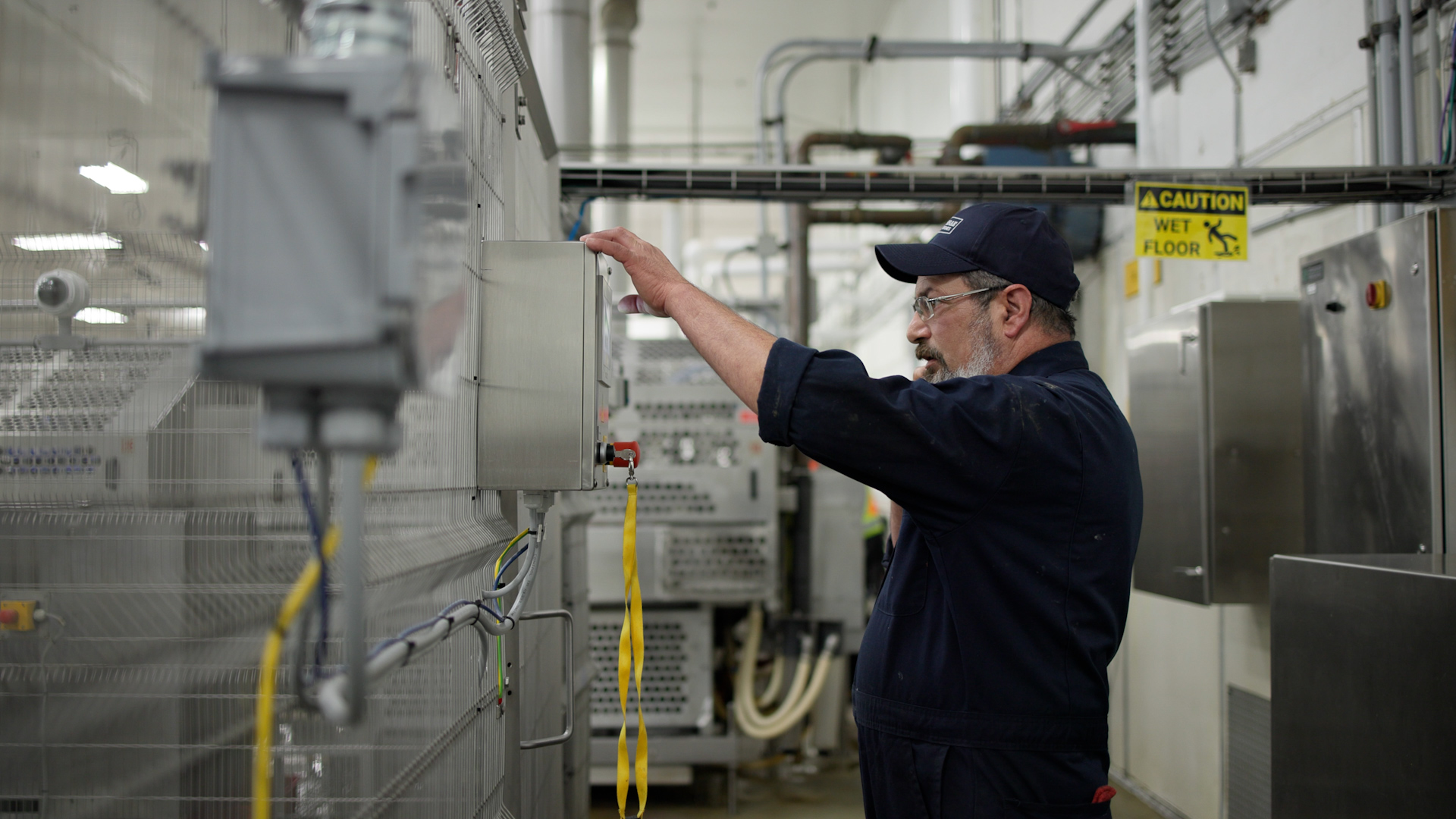 Operator working with SANOVO equipment at an egg processing facility.