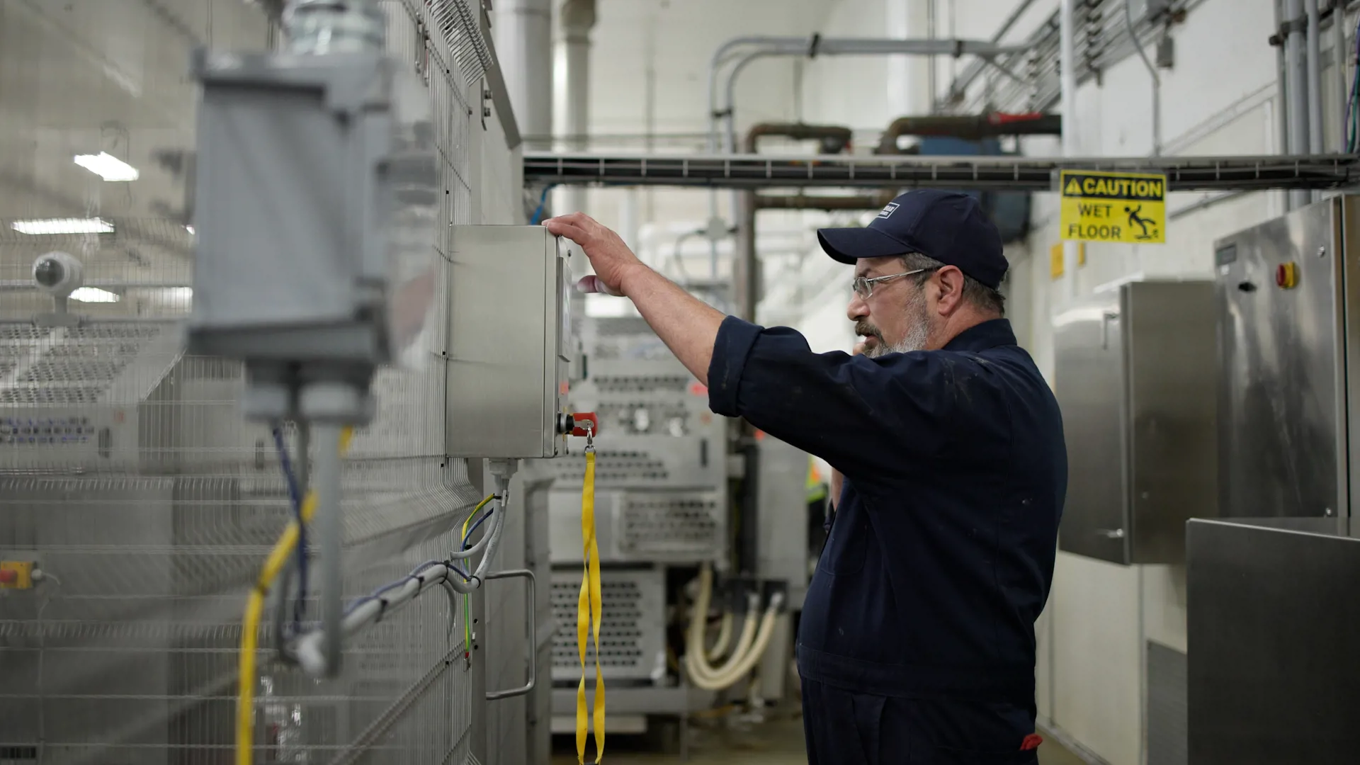 Operator working with SANOVO equipment at an egg processing facility.