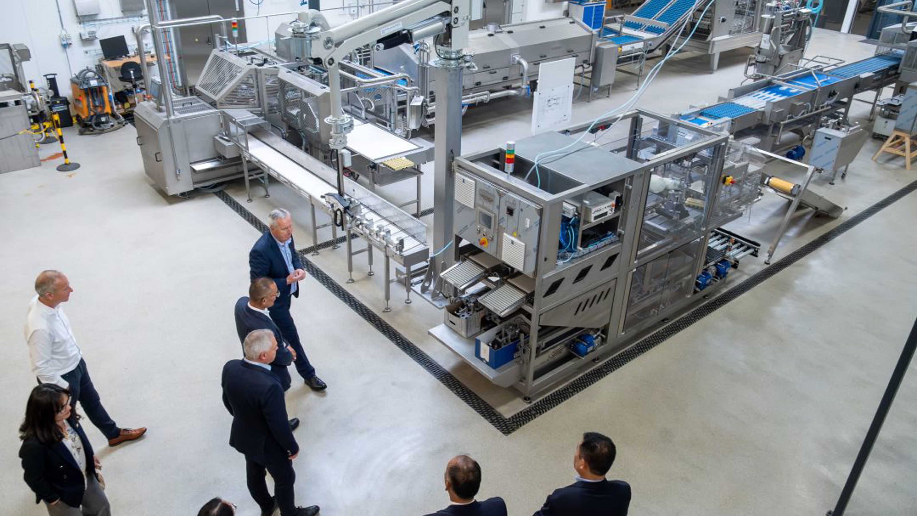 Bhutan’s Prime Minister touring SANOVO TECHNOLOGY GROUP's production facility in Denmark.