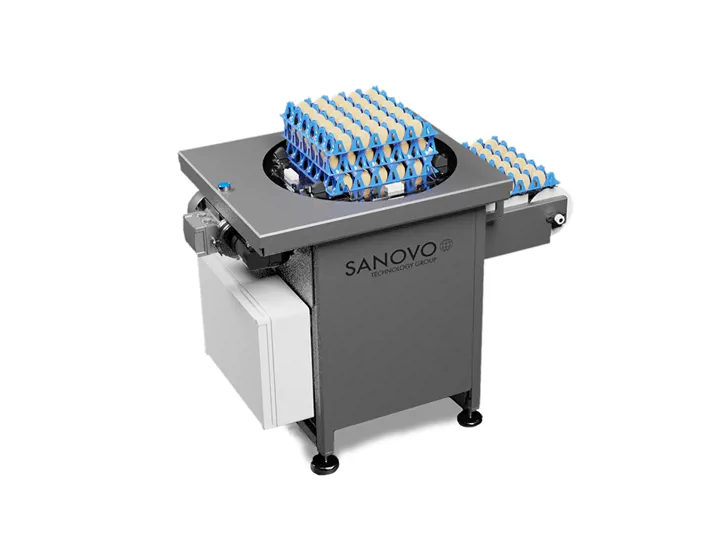 SANOVO Traystacker SX20 compact egg tray stacking unit with round turntable and outfeed conveyor.