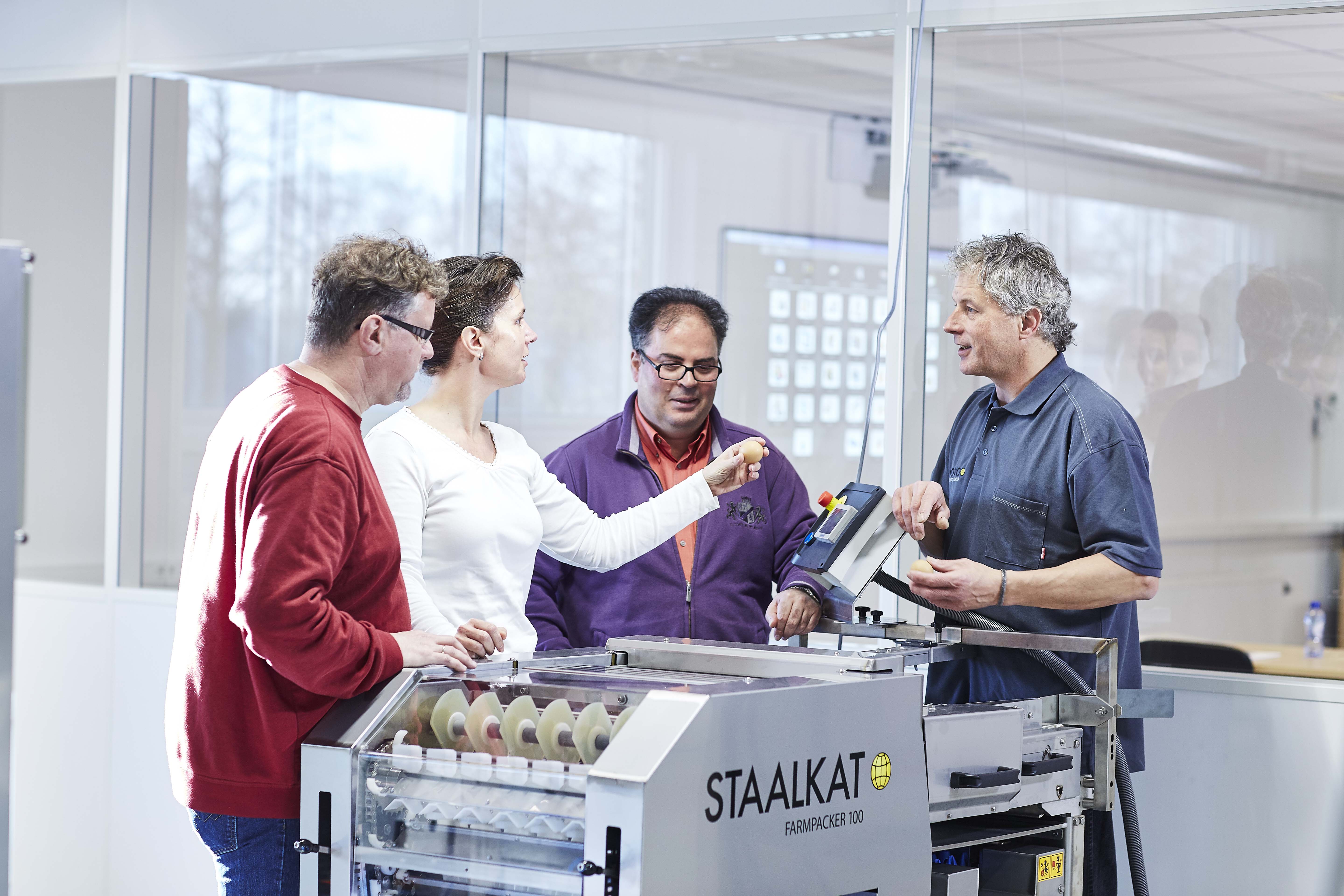 SANOVO TECHNOLOGY GROUP technician providing hands-on training on equipment.