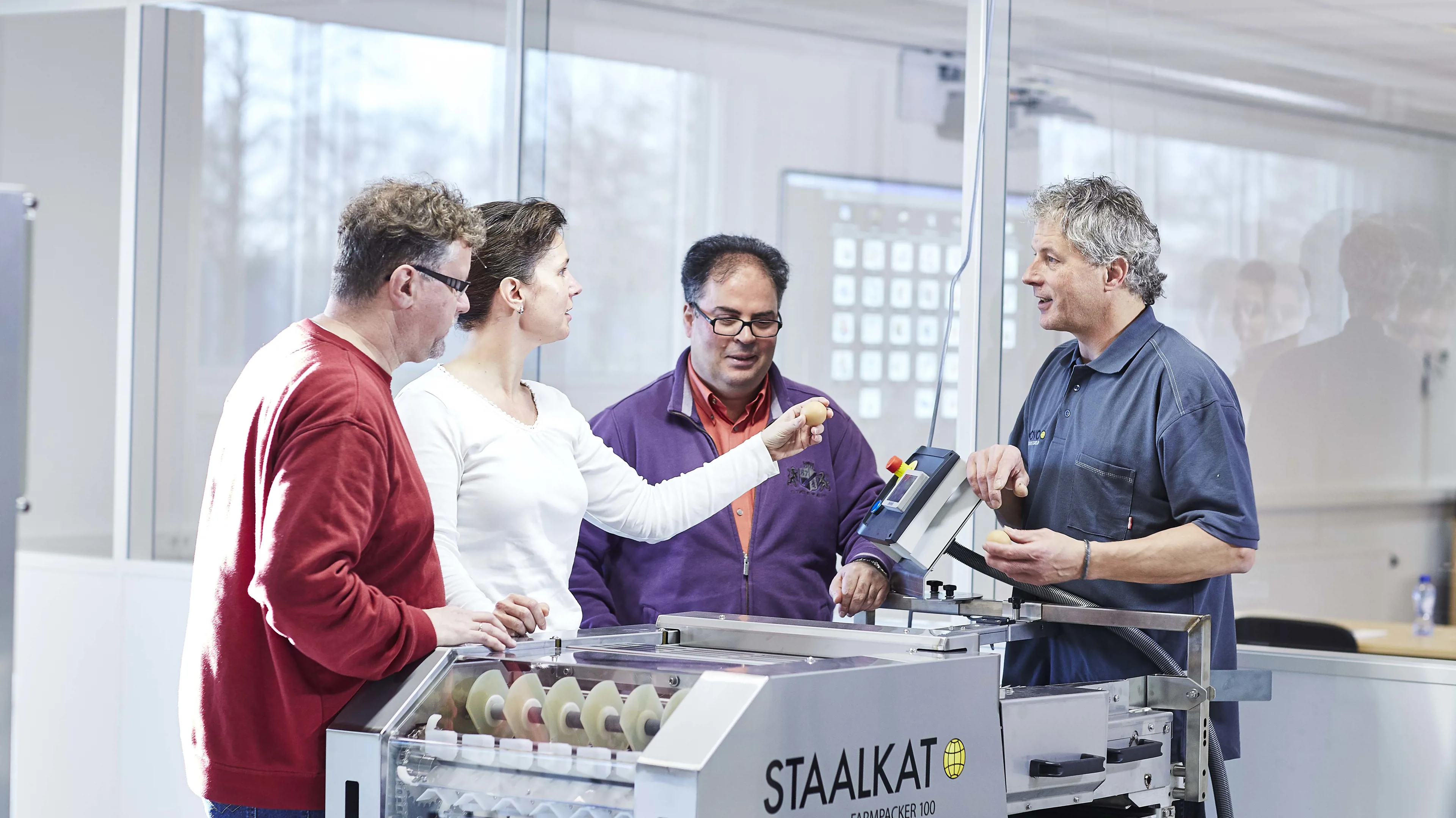 SANOVO TECHNOLOGY GROUP technician providing hands-on training on equipment.