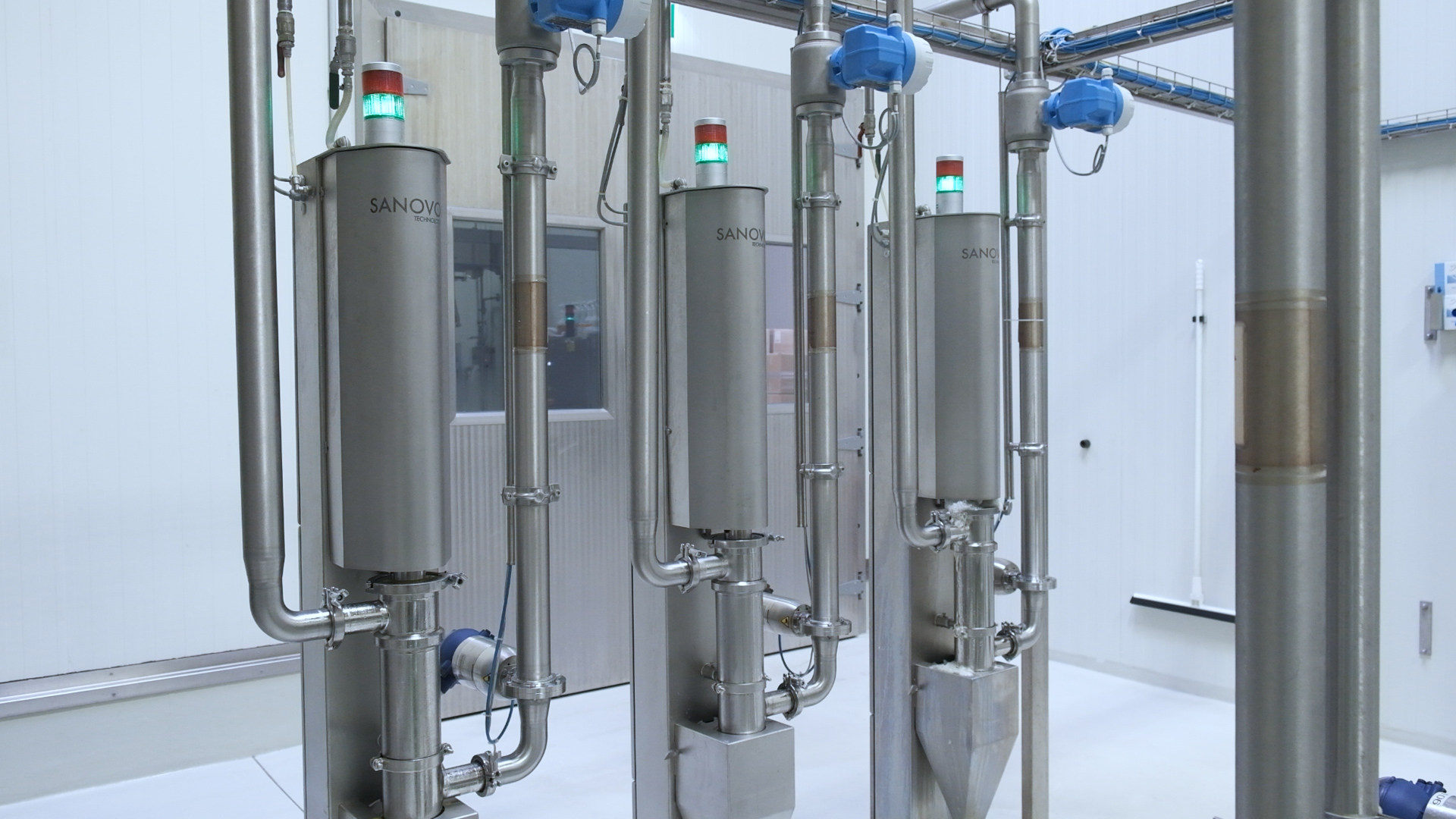 SANOVO automatic liquid egg filtration units in an egg processing plant.