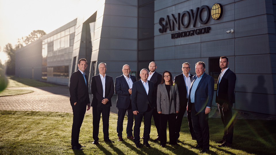 The top management of SANOVO TECHNOLOGY GROUP in front of the headquarters