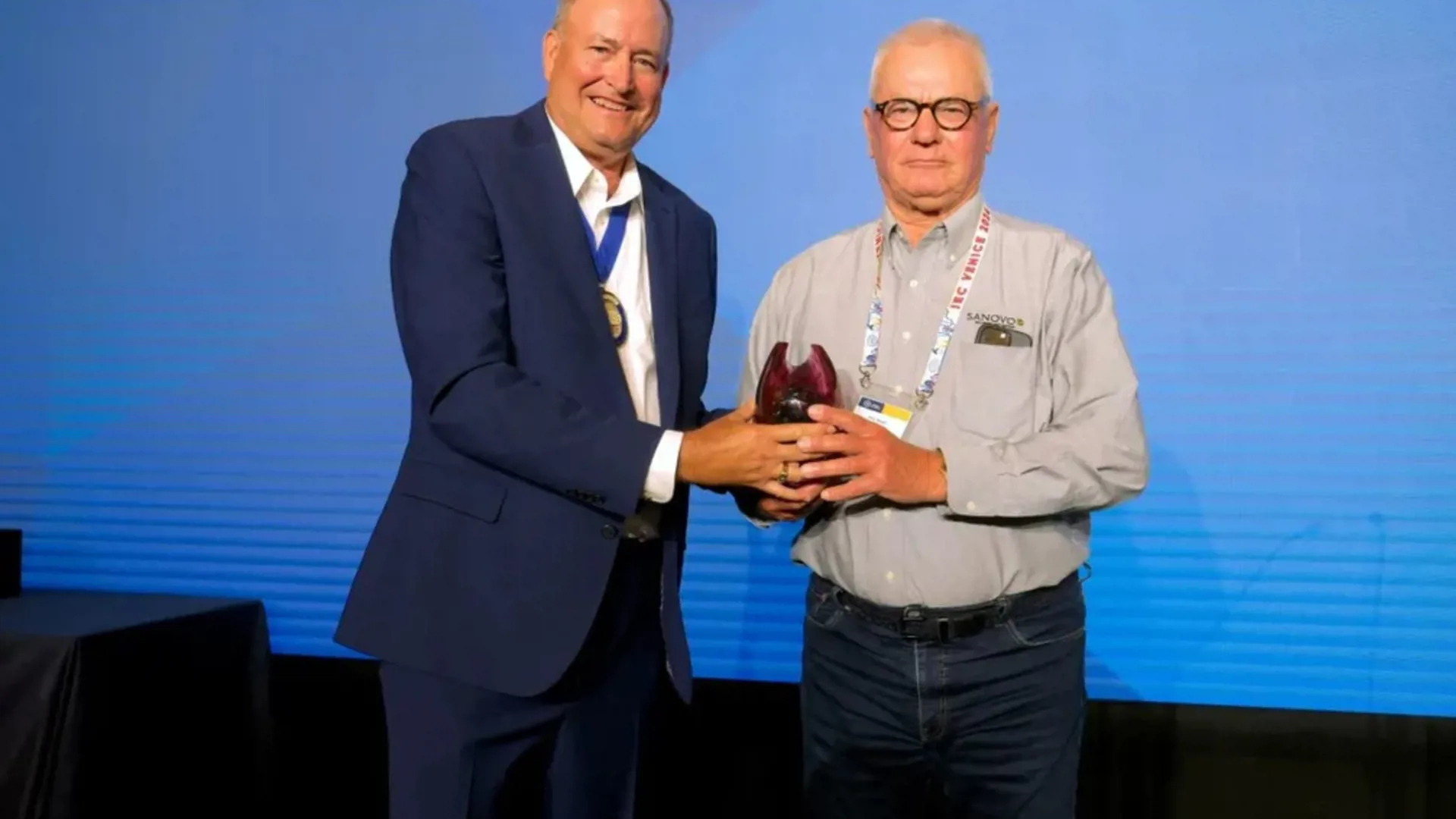 Thor Stadil receiving the Denis Wellstead Award for International Egg Person of the Year.