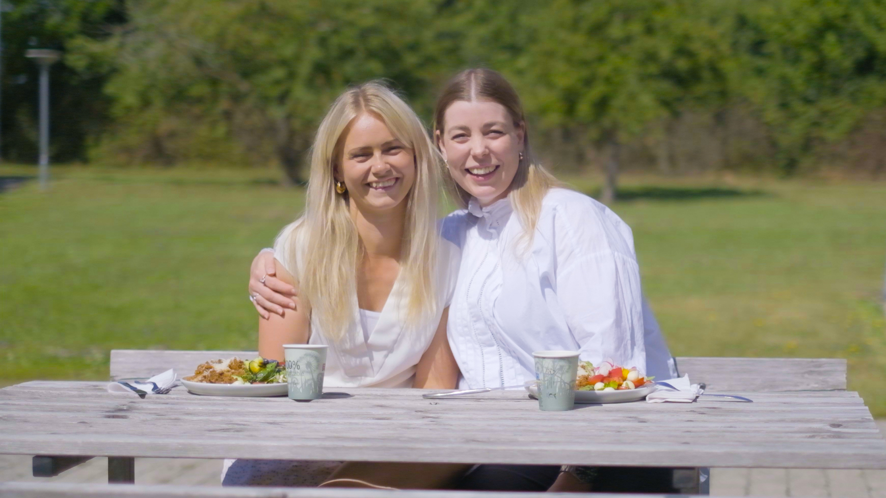 Two women eating lunch outside