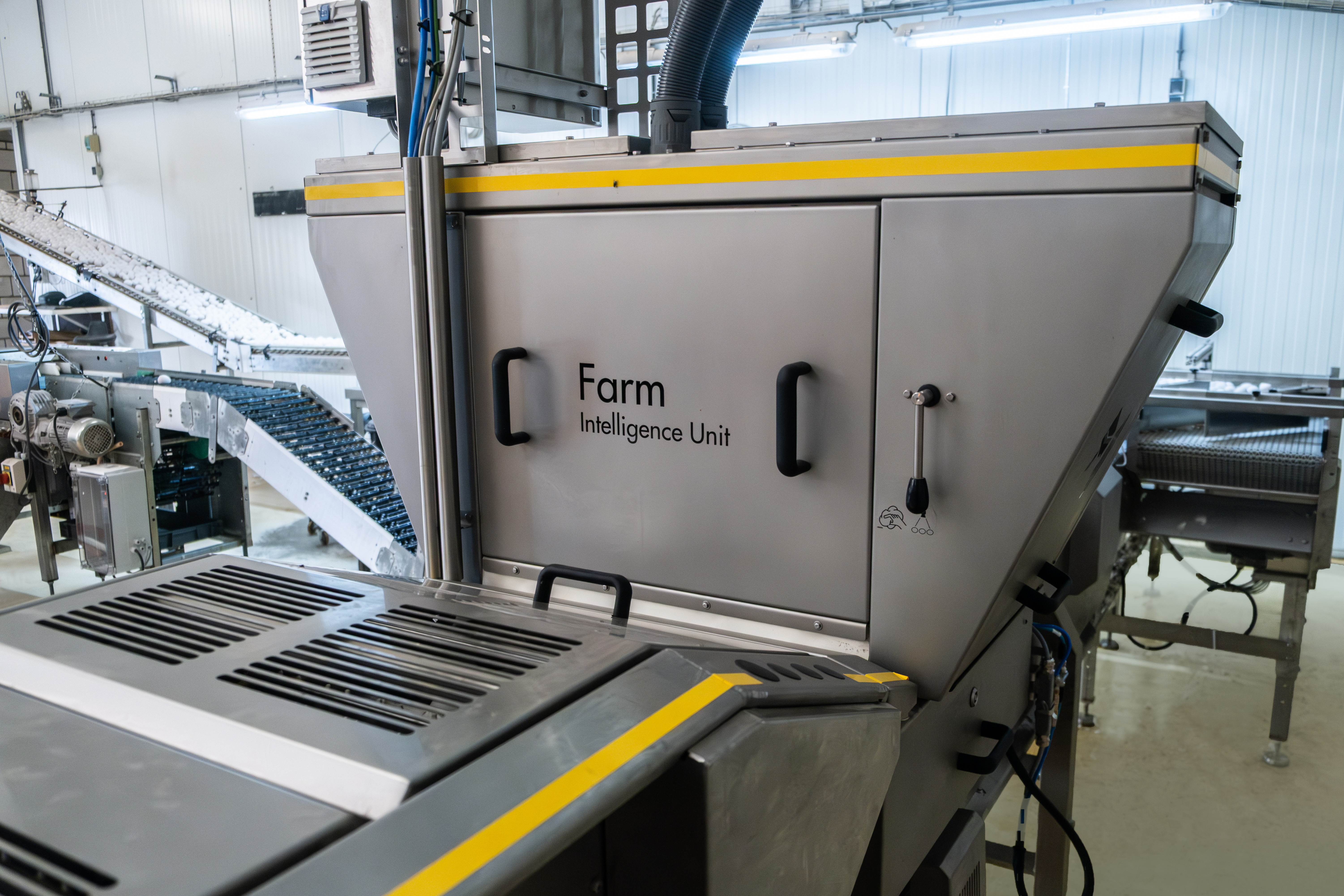 SANOVO Farm Intelligence Unit installed in an egg production facility for automated inspection with AI technology.