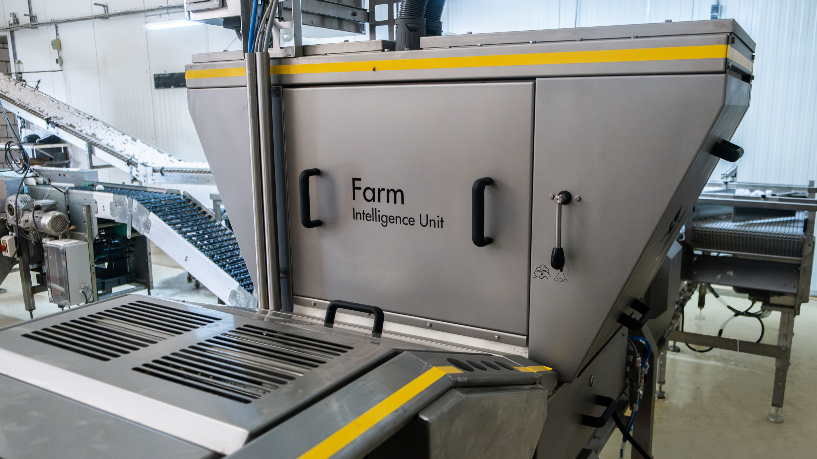 SANOVO Farm Intelligence Unit installed in an egg production facility for automated inspection with AI technology.