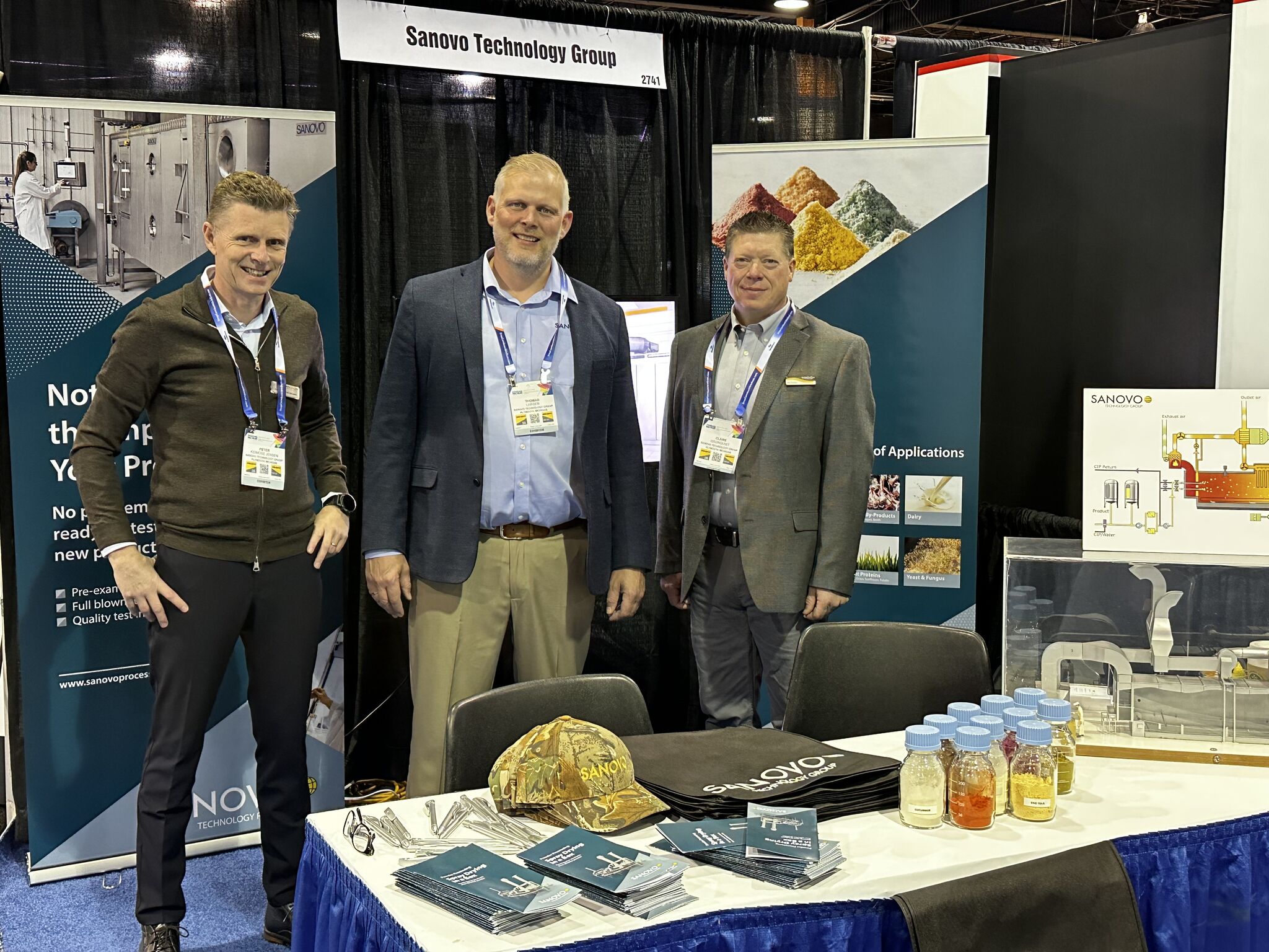 SANOVO TECHNOLOGY PROCESS team at the stand during an exhibition presenting food and ingredient processing technologies.