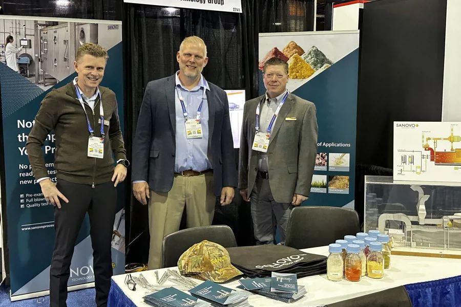 SANOVO TECHNOLOGY PROCESS team at the stand during an exhibition presenting food and ingredient processing technologies.