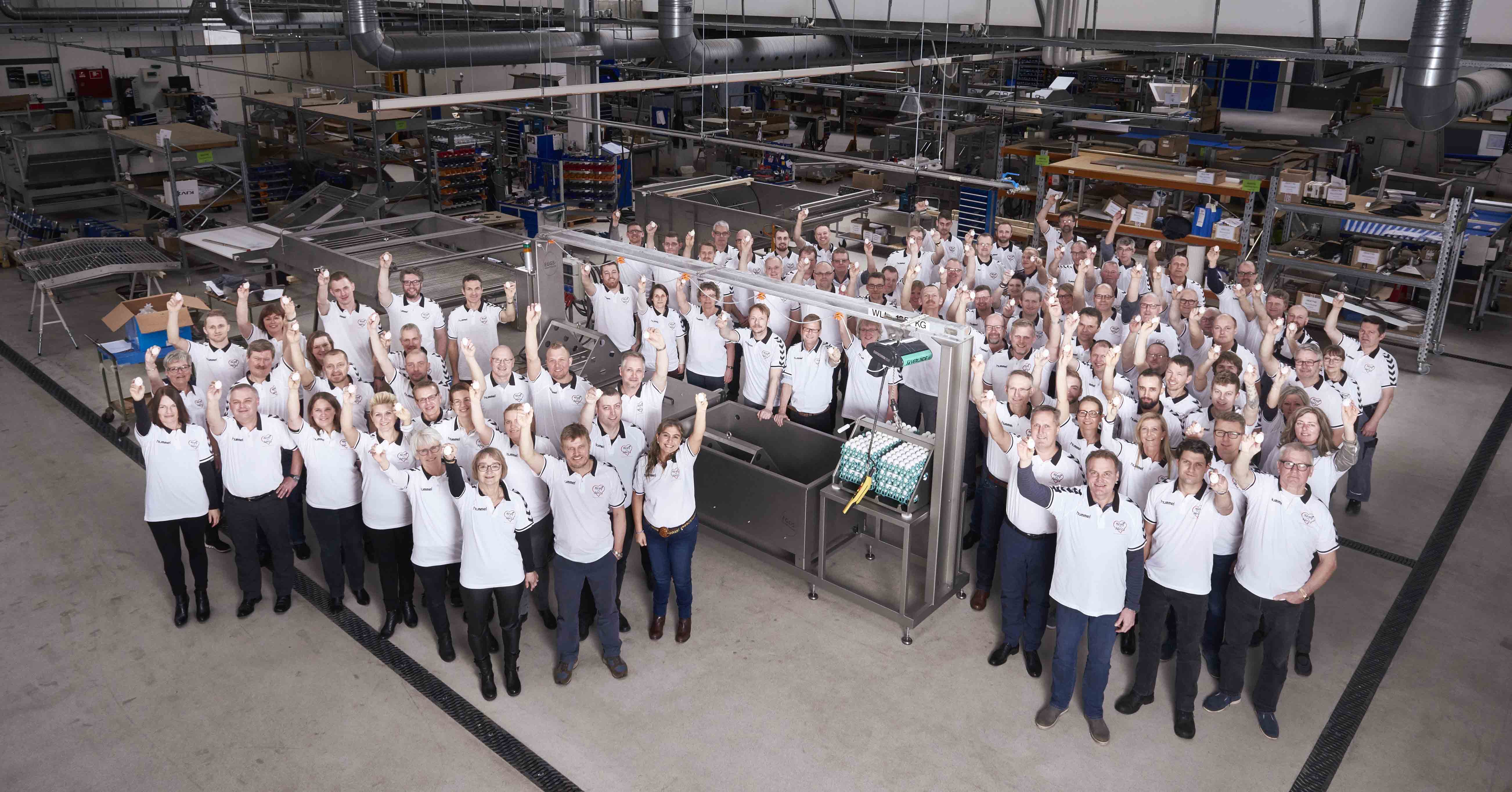 SANOVO TECHNOLOGY GROUP group photo inside facility. 