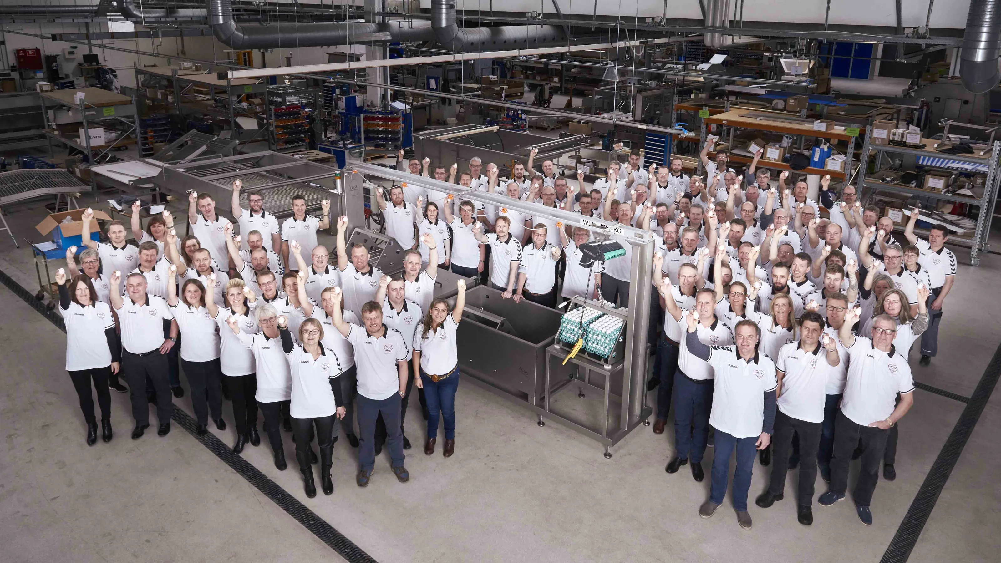 SANOVO TECHNOLOGY GROUP group photo inside facility.