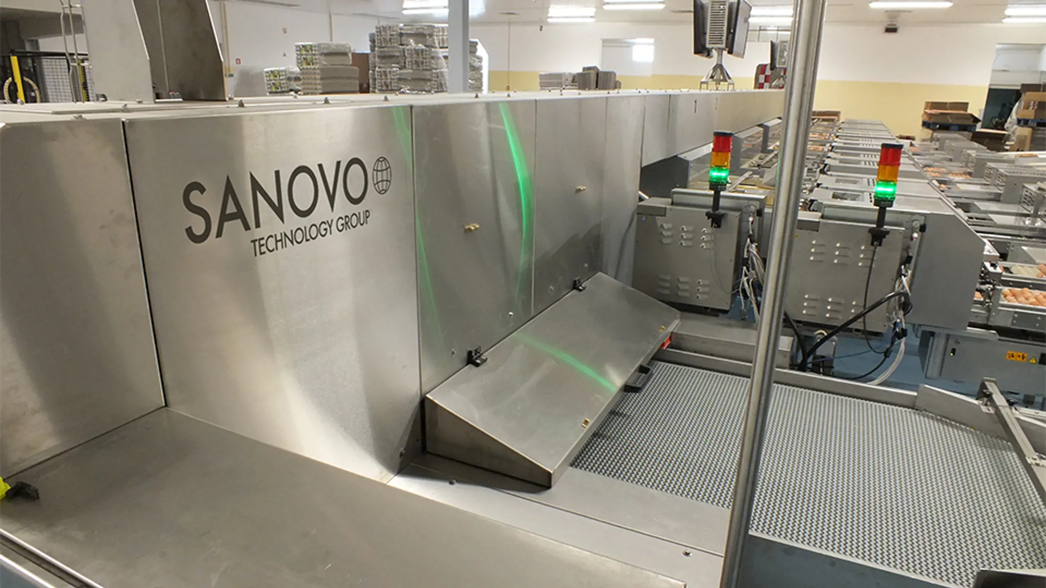 SANOVO Ardenta egg grading line offgrade belt removing rejected eggs during automated grading process.
