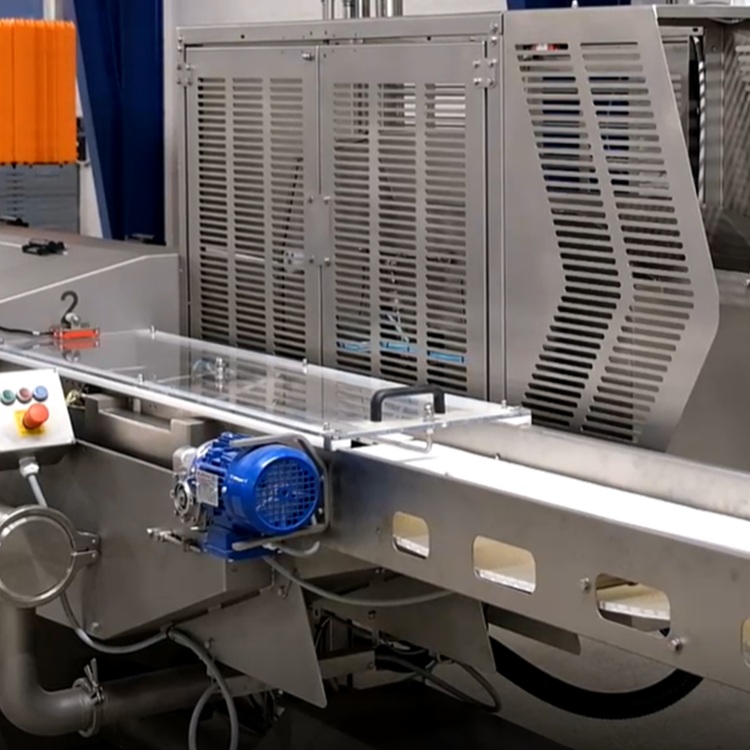 Infeed of a SANOVO egg tray washer in operation.