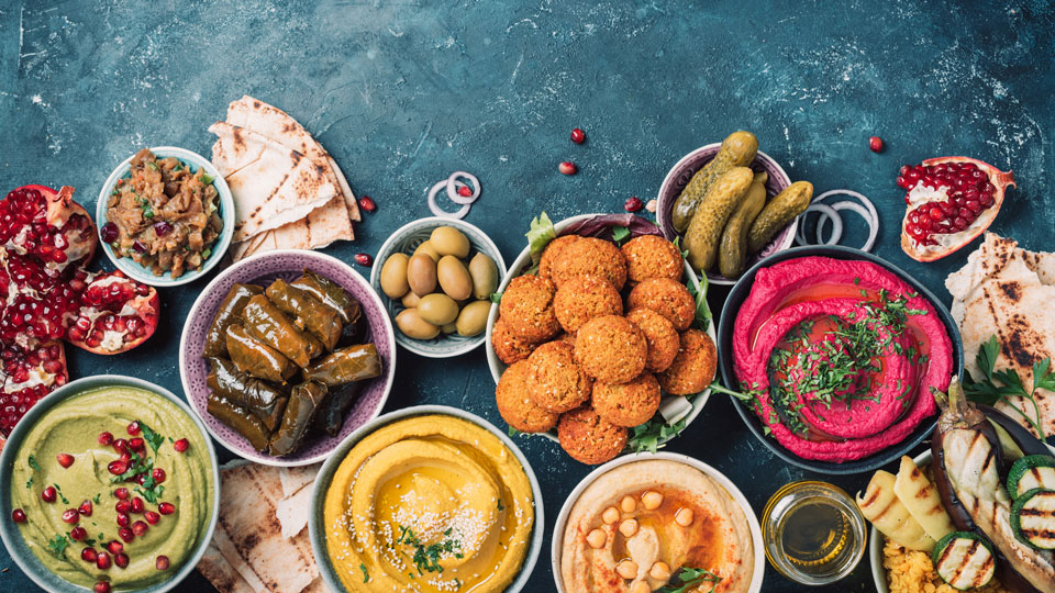 Assorted food products representing non-GMO, non-animal derived enzymes suitable for halal and kosher applications.