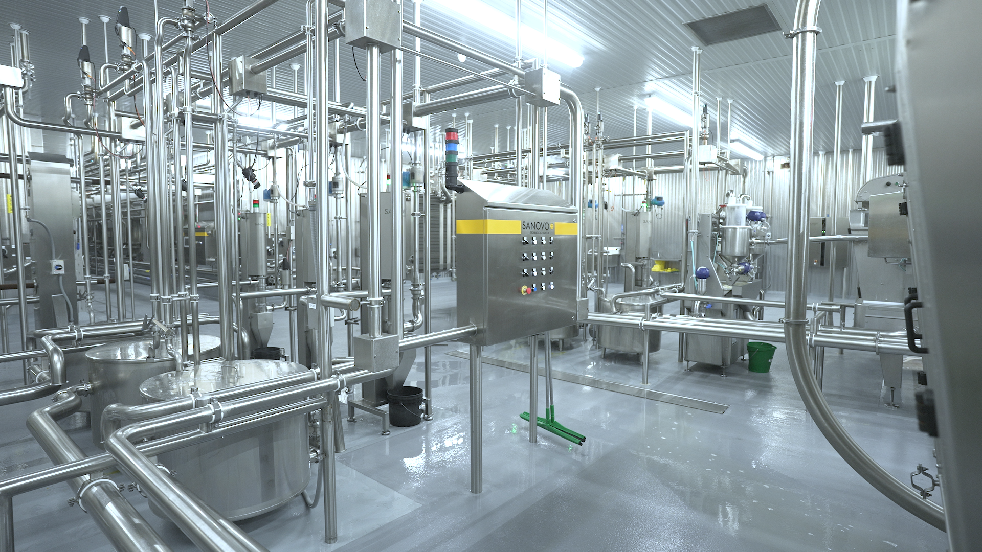 Collecting vats and filtration system for regulated liquid egg flow.