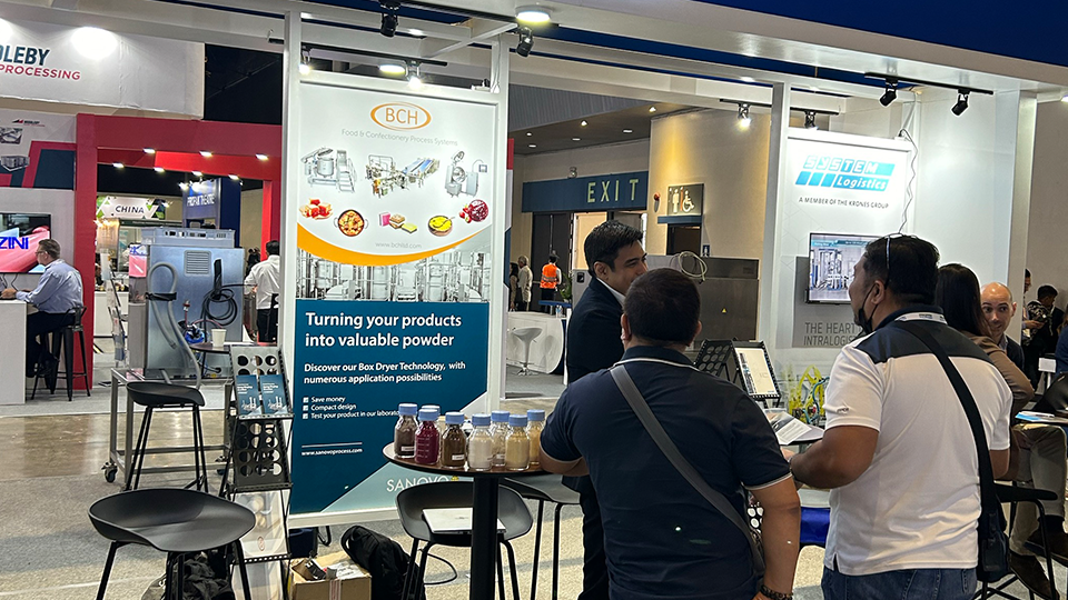 SANOVO TECHNOLOGY PROCESS team at an exhibition. 