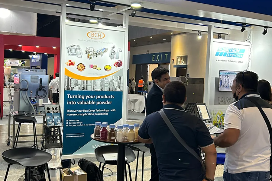 SANOVO TECHNOLOGY PROCESS team at an exhibition.