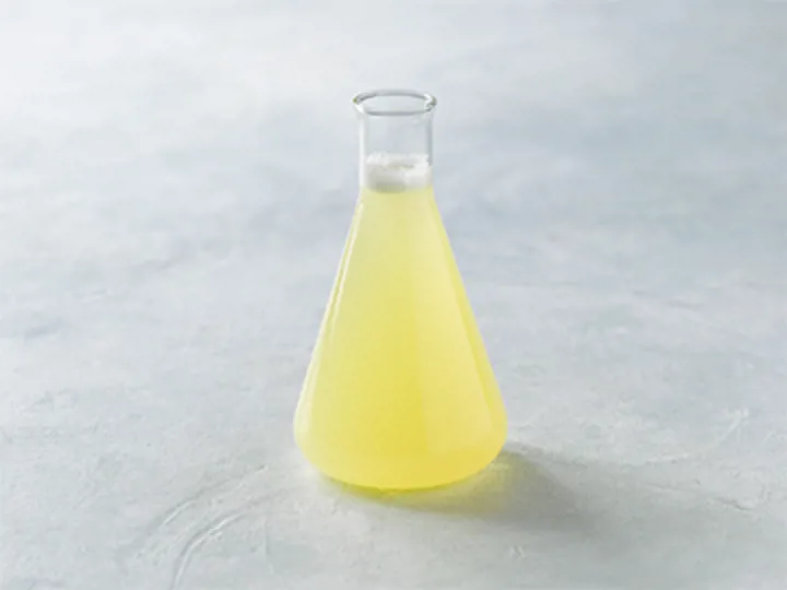 Egg white liquid sample for protein drinks and powders with MAXAMYL™NPU enzyme, offered by SANOVO PROCESS SOLUTIONS.